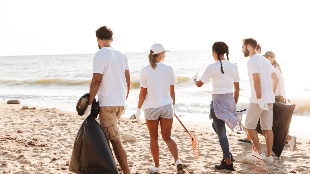 Friends walking down the beach