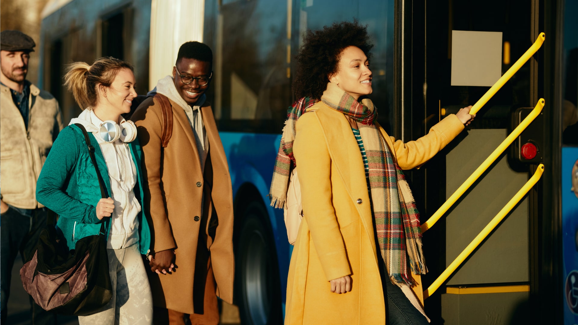 People embarking on a bus