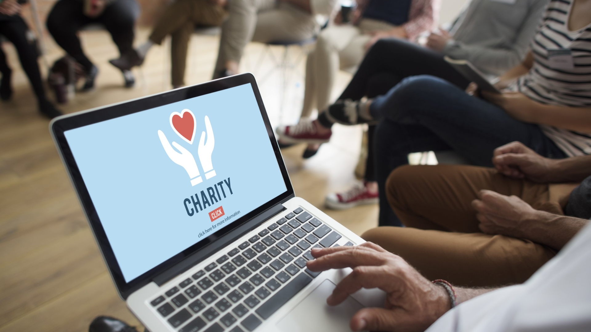 charity text on laptop screen